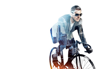 Double exposure of business man on a bicycle and city