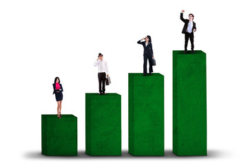 Fototapeta premium Business team standing on business graph