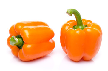Two orange peppers