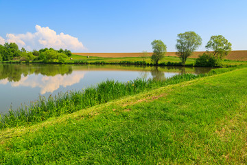 Lake in countryside landscape in spring, Austria