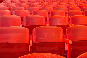 Fototapeta premium Rows of red chairs