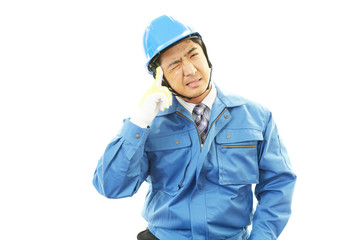頭痛を訴える作業員