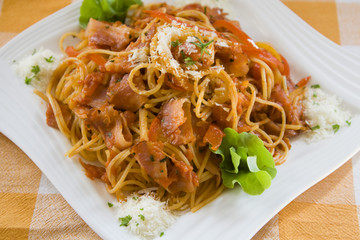 Pasta with bacon / Spaghetti with bacon on the table.