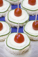 Appetizer on a toothpick.