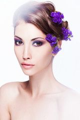 Fashion Beauty Model Girl with Flowers Hair. Bride. Perfect