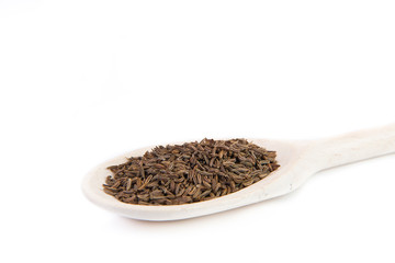 dry cumin on a spoon
