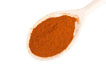 dry paprika on a spoon