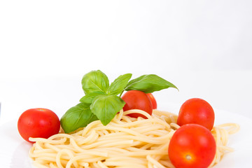 Spaghetti with cherry tomatoes and basil