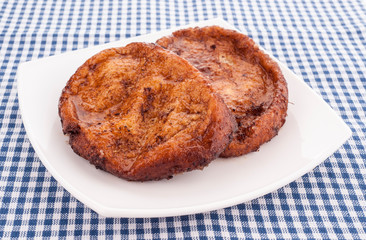 homemade French toast on white plate