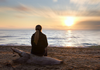 Female silhouette on seacoast