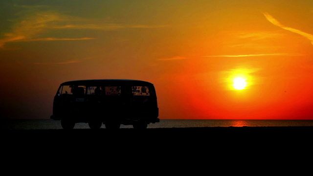 Minibus at sunset