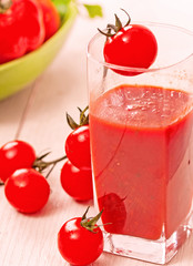 tomato juice and fresh organic cherry tomato