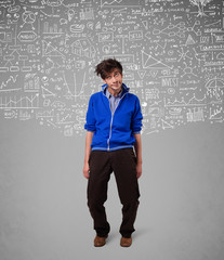 Young handsome guy with hand drawn calculations and icons