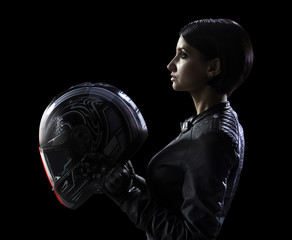 woman biker isolated in black bg