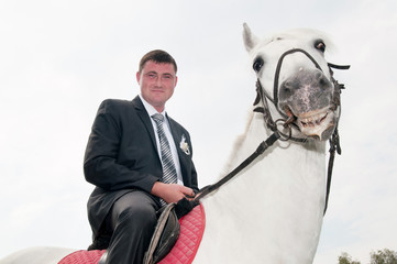 man sitting on a horse