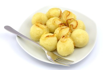 Naklejka na ściany i meble potato dumplings with onion