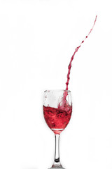 Red wine splash with drops