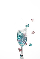 Water splashing in a glass, isolated on white
