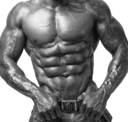 Close up on perfect abs. Strong bodybuilder with six pack