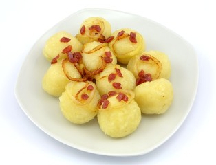 Naklejka na ściany i meble potato dumplings with onion and sausage