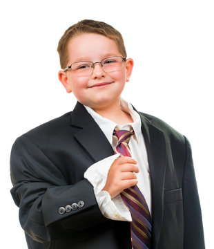 Happy Child Wearing Suit That Is Too Big For Him