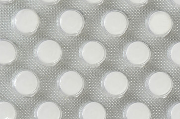 Tablets in packing. A medical background