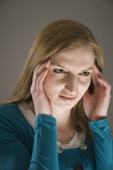 woman in migraine side