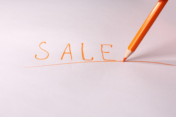 Word Sale and pencil on paper, isolated on white
