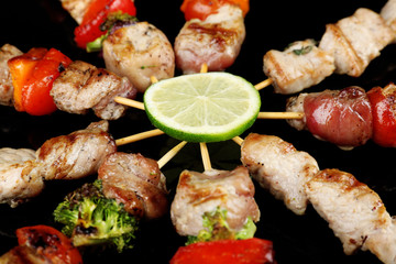 Pork kebab on black background
