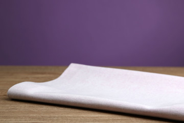 Background with wooden table and tablecloth