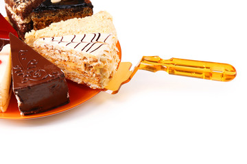 Assortment of pieces of cake, isolated on white © Africa Studio
