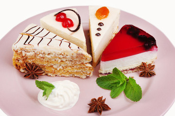 Assortment of pieces of cake, close up © Africa Studio