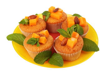Tasty pumpkin muffins, isolated on white