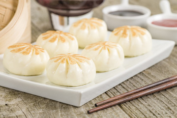 Salapao - Thai steamed buns filled with chicken. © paul_brighton