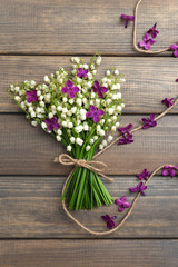 Beautiful lilac flowers and lilies of the valley,