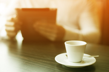 Coffe break and reading news at motning