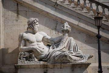 Fototapeta na wymiar Statue of Neptune at Piazza del Campidoglio, Rome