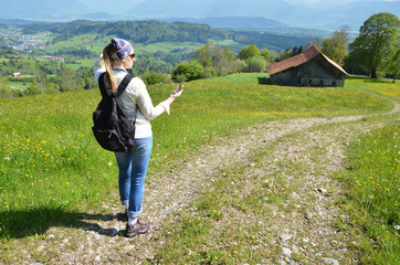 Traveler with a compass in the hand