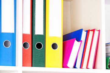Folders on shelves