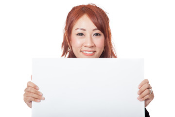 Asian office girl hold a blank sign with both hand and smile