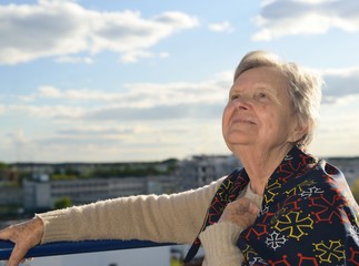 Fototapeta premium Senior happy woman with grey hairs - outdoors.