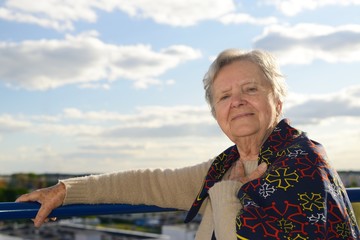 Fototapeta premium Senior happy woman with grey hairs - outdoors.