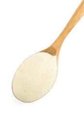 semolina in spoon  on white