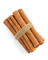 cinnamon sticks on white