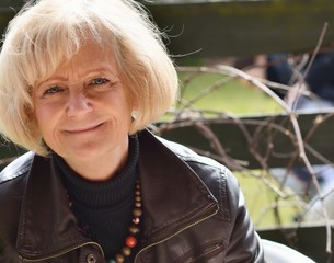 Mature woman, outdoor in park.