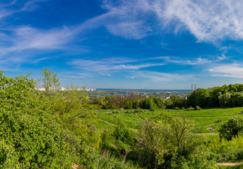 Fototapeta na wymiar Cityscape of Kiev, Ukraine. Green trees, landscape