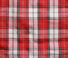Texture of a red checkered picnic blanket.