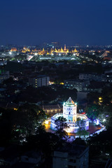Ancient fortress tower with Grand Palace background