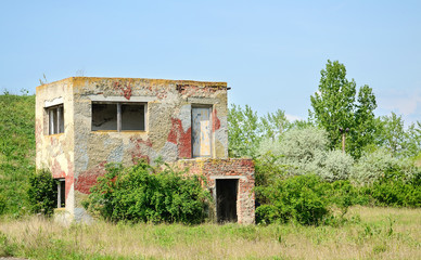 Abandoned ruined brick house