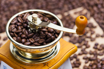 detail of coffee mill with coffee beans